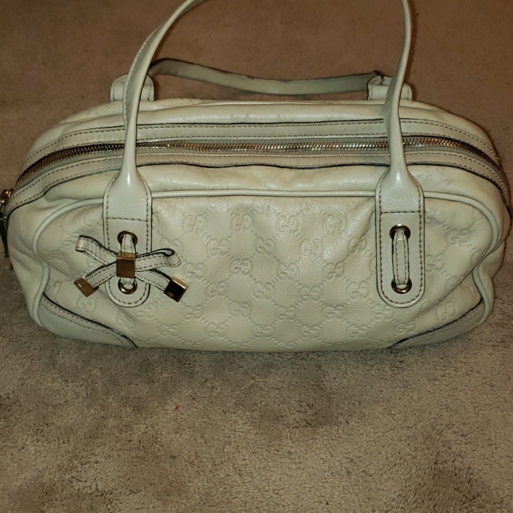 Gucci princy shoulder used bag with tons of life